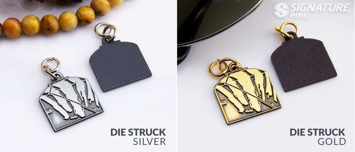 Die struck charms comparing silver and gold plating options with split ring attachments