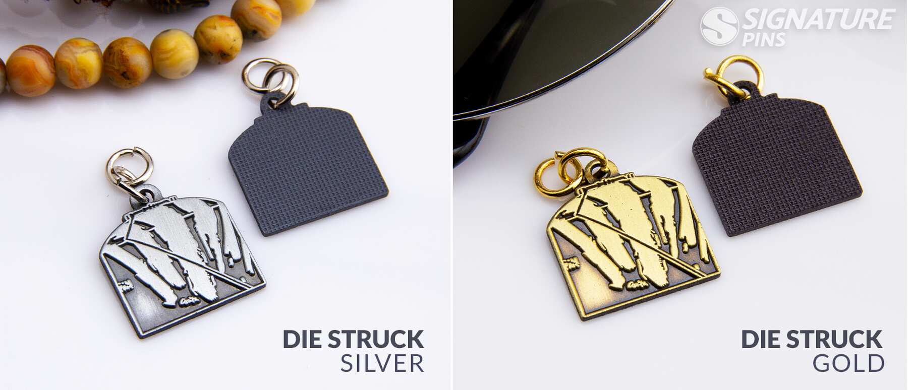 Die struck charms comparing silver and gold plating options with split ring attachments