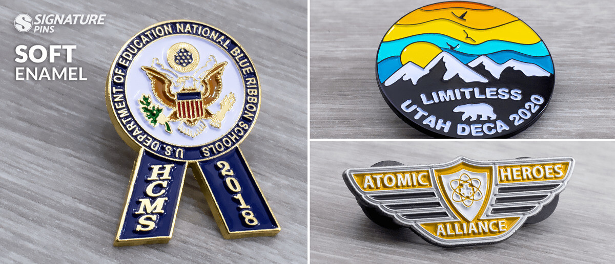 Three soft enamel pins showing the textured, layered look where colored enamel sits below raised metal lines
