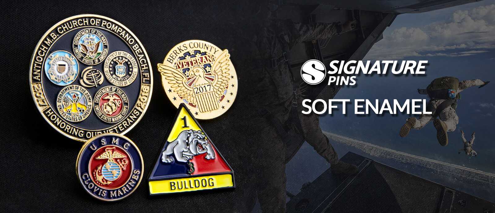 Soft enamel military pins including a veterans pin featuring all service branch seals, Berks County Veterans 2017 eagle pin, USMC Clovis Marines pin, and 1st Armored Division Bulldog unit pin