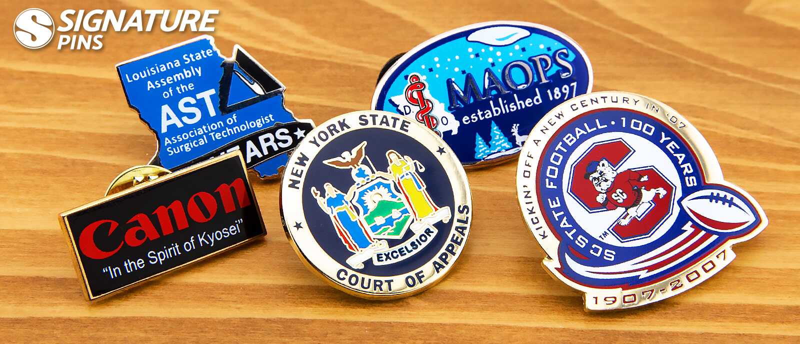 Collection of custom wholesale lapel pins for corporations, state government courts, medical associations, and sports organizations